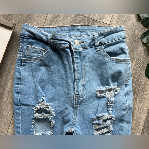 Shein high waisted ripped flared jeans in light wash blue. Size petite M/6 - Picture 7 of 13